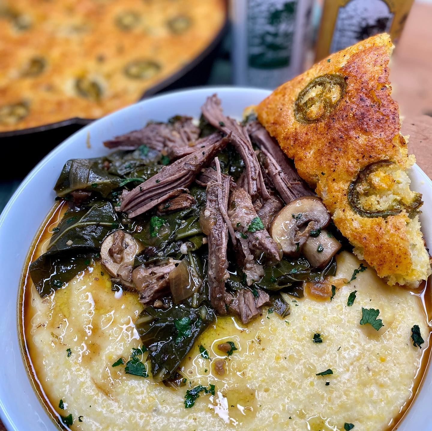 Short Ribs Cornbread Braised Short Rib w/ Collard greens over Cheesy Grits & Jalapeno Cornb ...